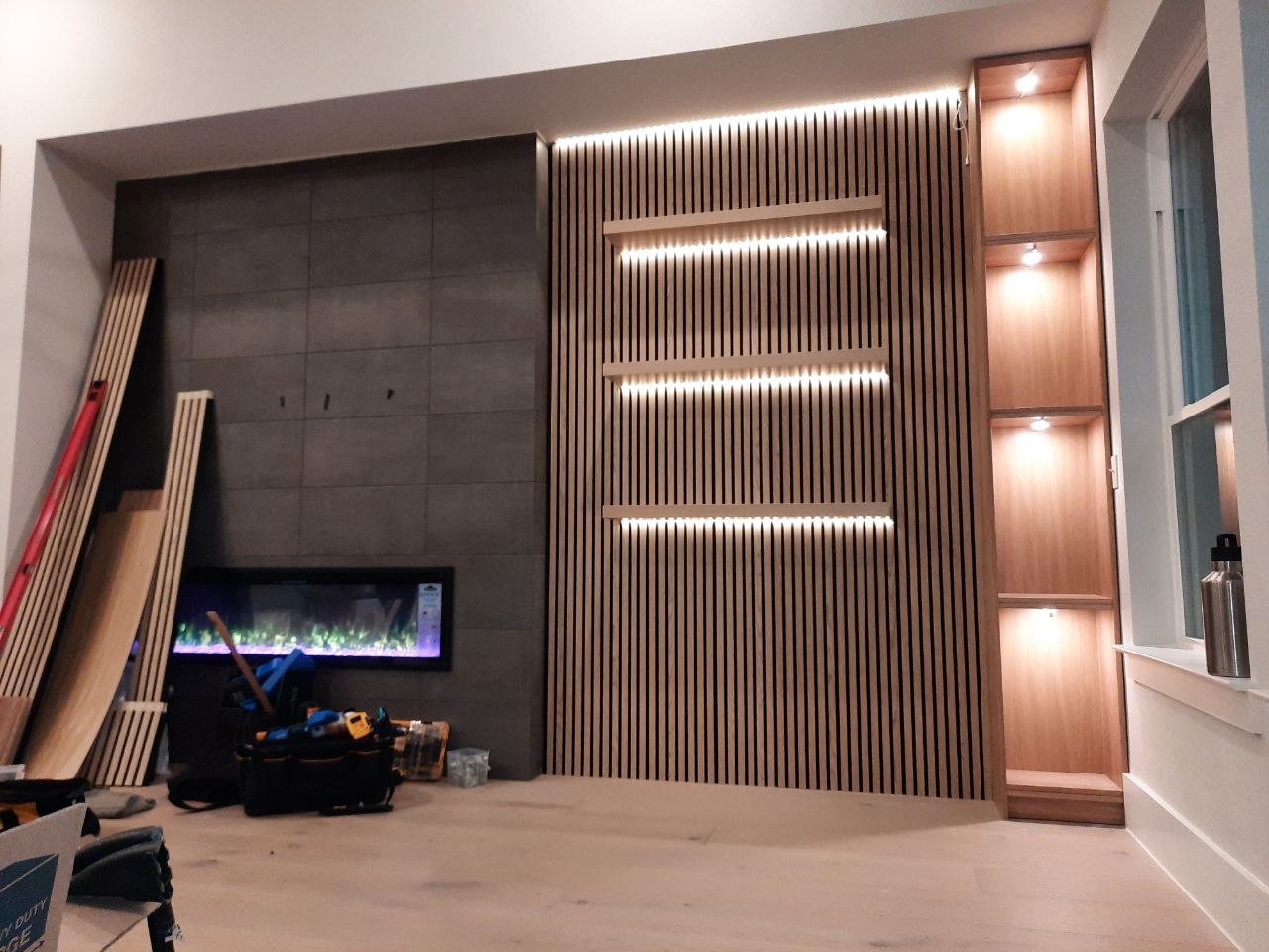 Custom slat wall shelving and lighting